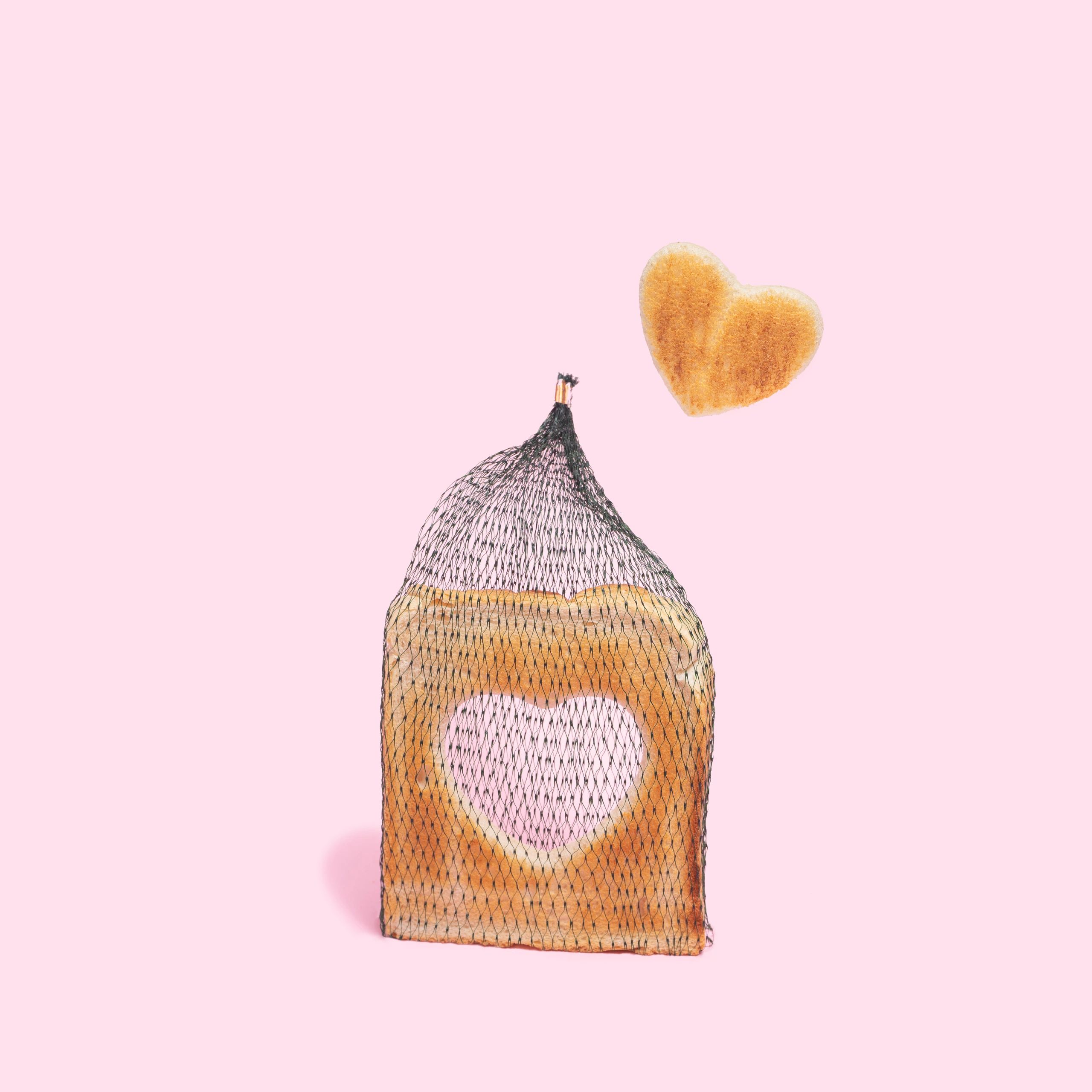 Conceptual heart-shaped toast artwork